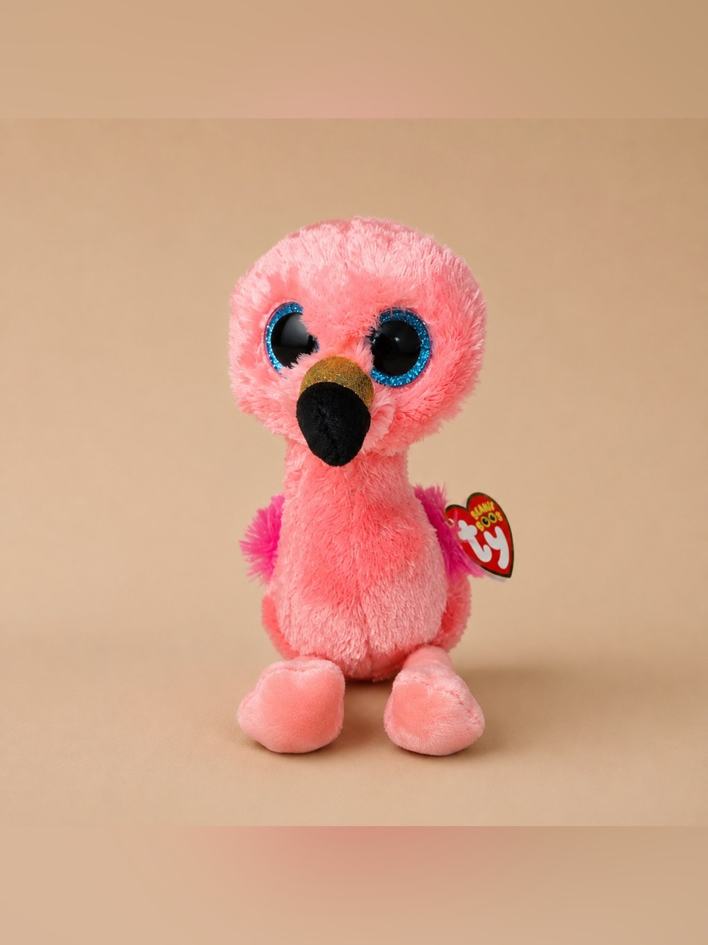 Gilda the Flamingo, a member of the Ty Beanie Boos collection With Tags